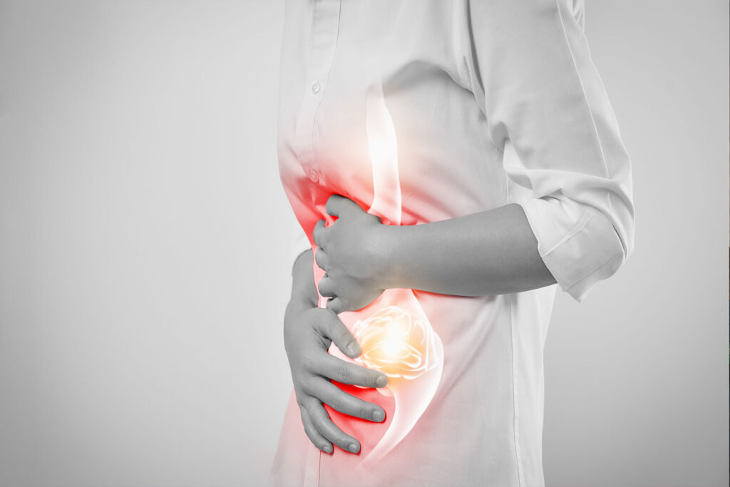 woman hands touching belly and stomach